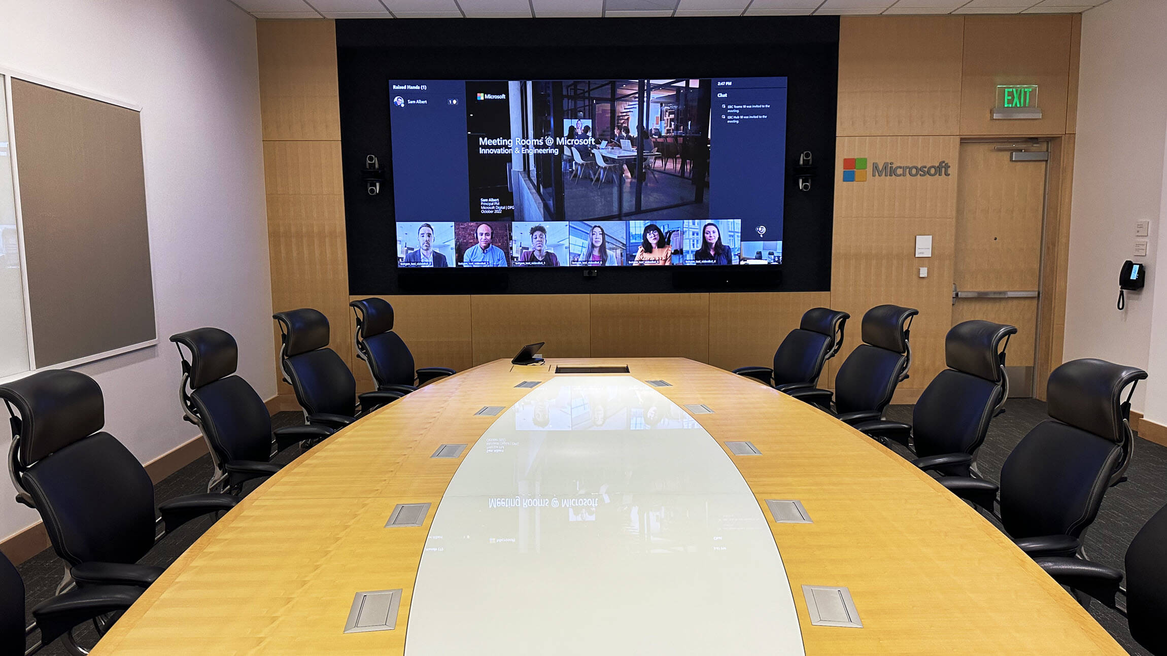 Executive conference room prepared for a protected hybrid meeting